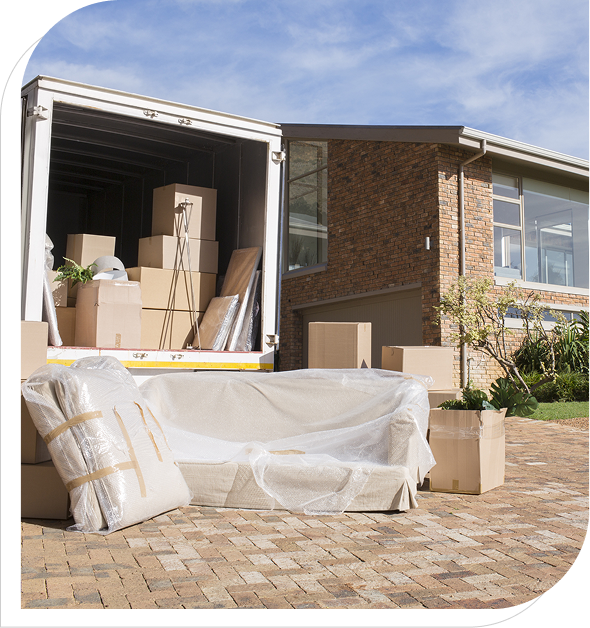 Moving truck with boxes and wrapped furniture
