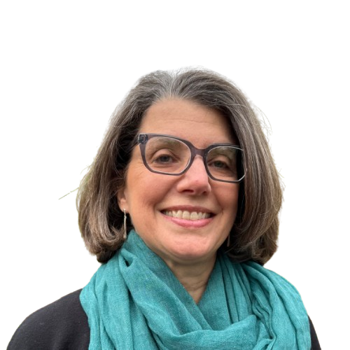Smiling woman with glasses and teal scarf