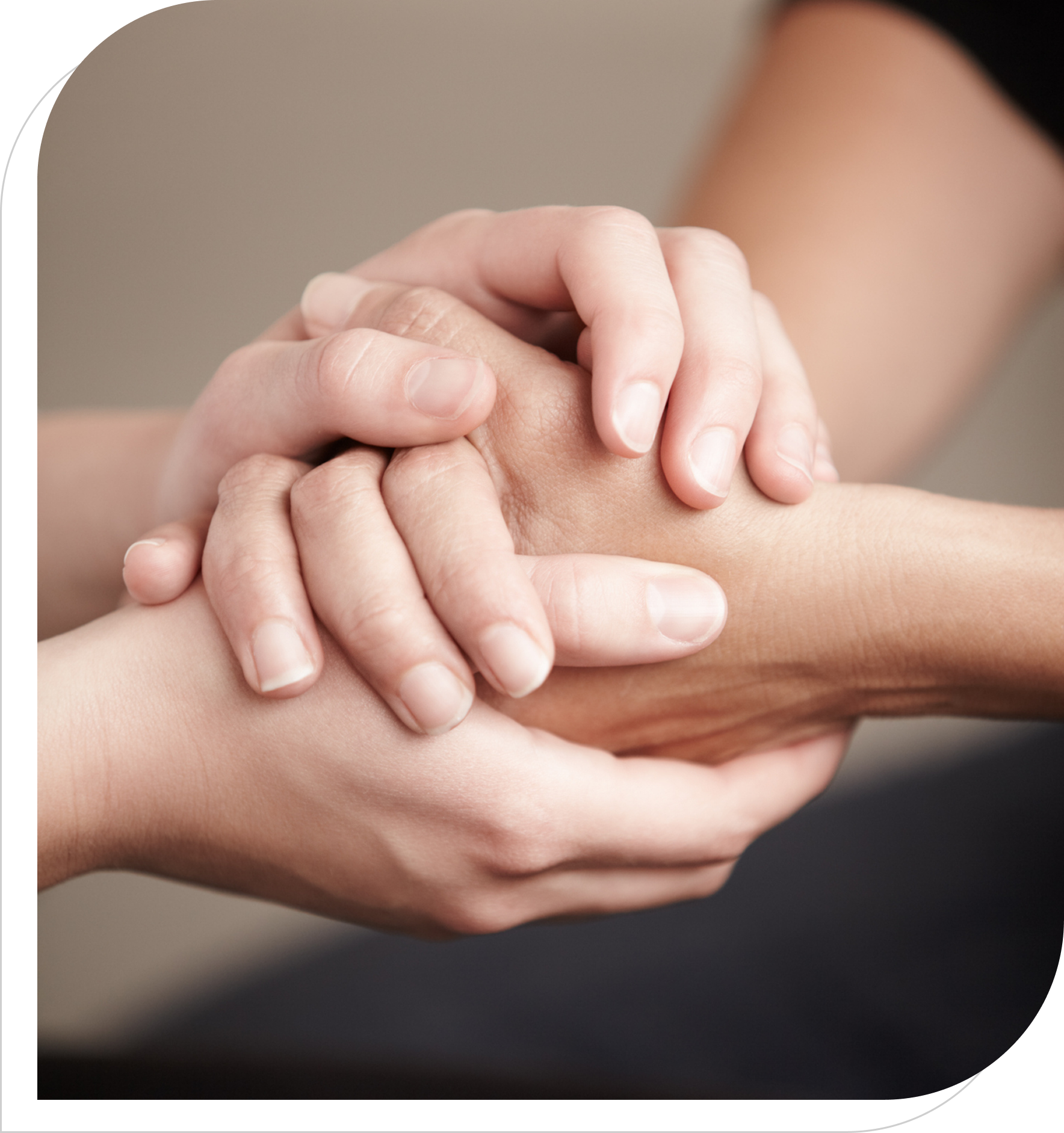 Two pairs of hands in comfort