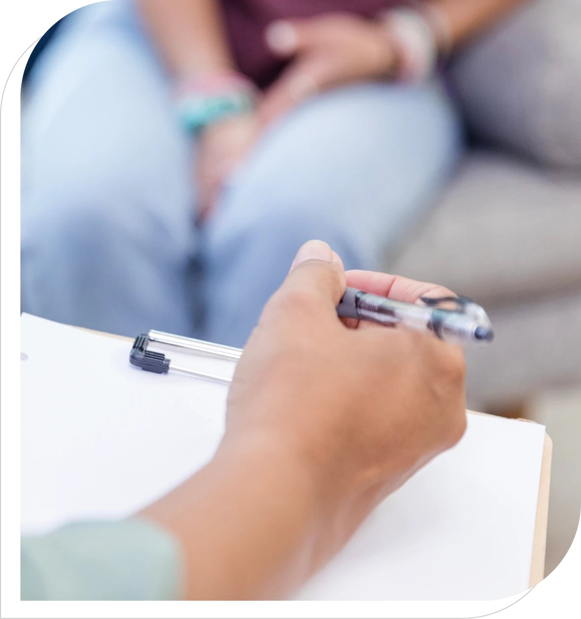 Therapy session with note-taking